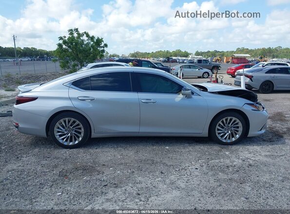 58AFA1C19MU006898 2021 LEXUS ES 300H Silver Vista interior trasera