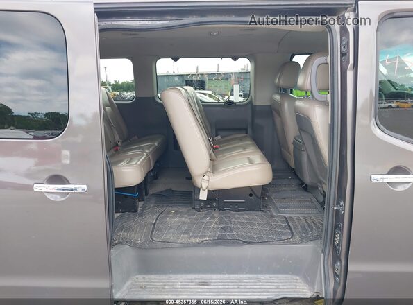 5BZAF0AA8GN855715 2016 NISSAN NV PASSENGER NV3500 HD Коричневый Вид наклейки с VIN-кодом