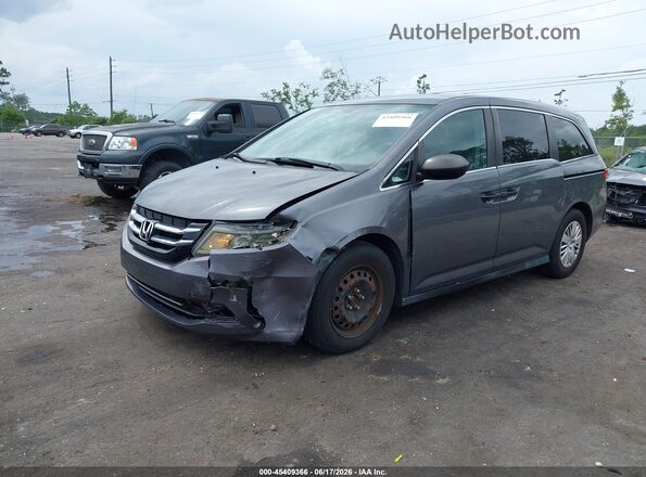 5FNRL5H26GB014613 2016 HONDA ODYSSEY Gray Առջևի ձախ երեք քառորդ տեսարան