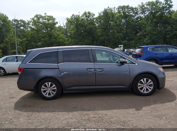5FNRL5H32GB094064 2016 HONDA ODYSSEY Gray Rear interior view