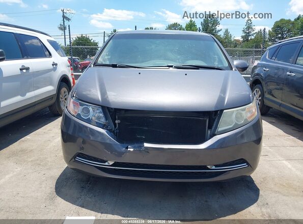 5FNRL5H34GB040975 2016 HONDA ODYSSEY Gray Widok wnętrza z tyłu