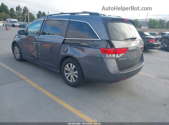 5FNRL5H39GB034301 2016 HONDA ODYSSEY Gray Trasero izquierdo