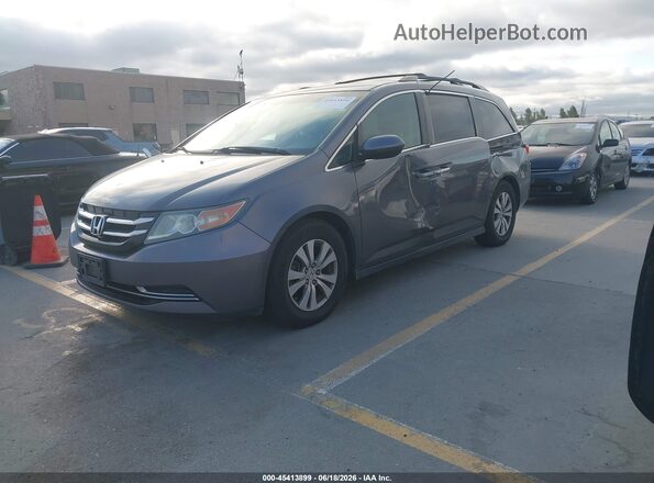 5FNRL5H39GB034301 2016 HONDA ODYSSEY Gray Vista tres cuartos delantera izquierda