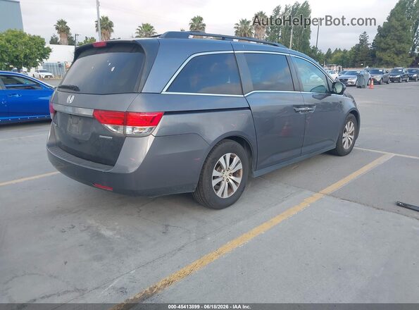 5FNRL5H39GB034301 2016 HONDA ODYSSEY Gray Trasero derecho