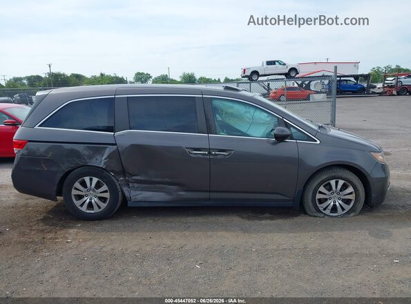 5FNRL5H63GB024406 2016 HONDA ODYSSEY Gray Widok wnętrza z tyłu