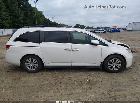5FNRL5H64GB061495 2016 HONDA ODYSSEY White Սալոնի հետևի տեսք