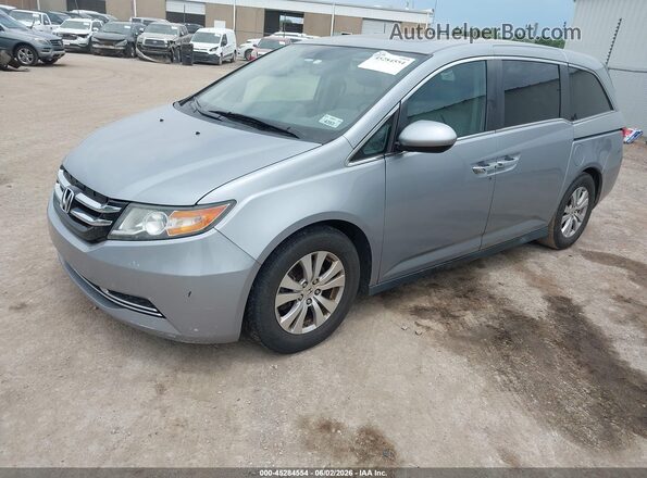 5FNRL5H68GB091809 2016 HONDA ODYSSEY Silver Przód lewy