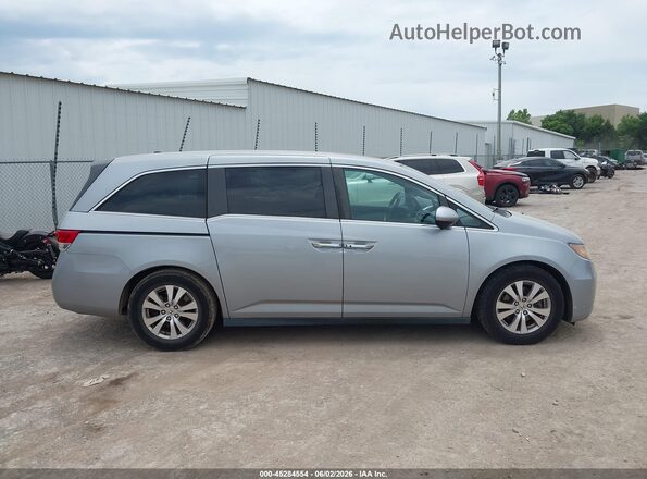 5FNRL5H68GB091809 2016 HONDA ODYSSEY Silver Widok wnętrza z tyłu