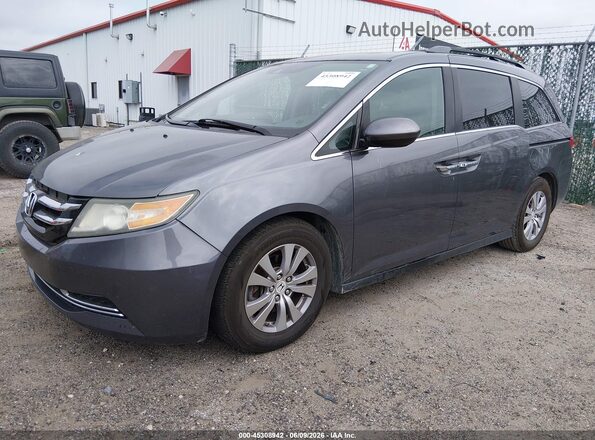 5FNRL5H69GB063890 2016 HONDA ODYSSEY Gray Առջևի ձախ երեք քառորդ տեսարան