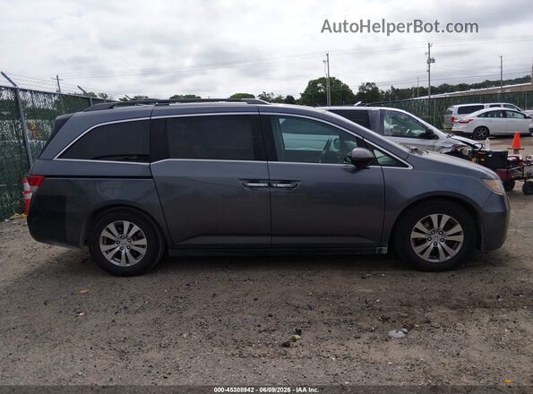 5FNRL5H69GB063890 2016 HONDA ODYSSEY Gray Սալոնի հետևի տեսք