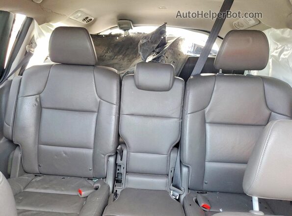 5FNRL5H69GB087980 2016 HONDA ODYSSEY Black Rear seats view