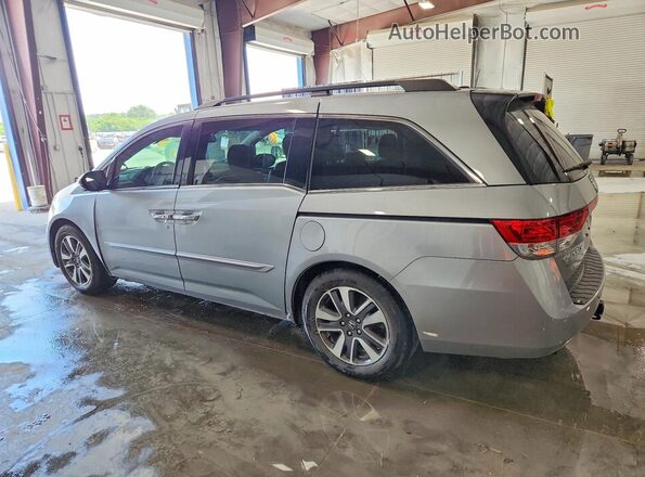 5FNRL5H97HB000329 2017 HONDA ODYSSEY Silver Trasero izquierdo
