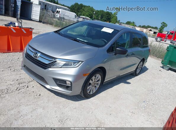 5FNRL6H2XJB105901 2018 HONDA ODYSSEY Silver Vista tres cuartos delantera izquierda