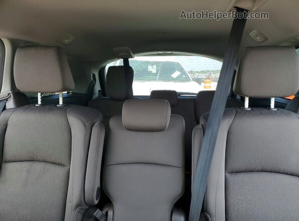 5FNRL6H51PB018374 2023 HONDA ODYSSEY Silver Rear seats view