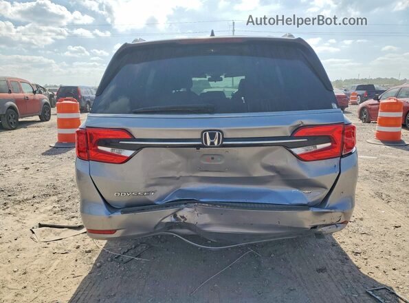 5FNRL6H51PB018374 2023 HONDA ODYSSEY Silver Rear view