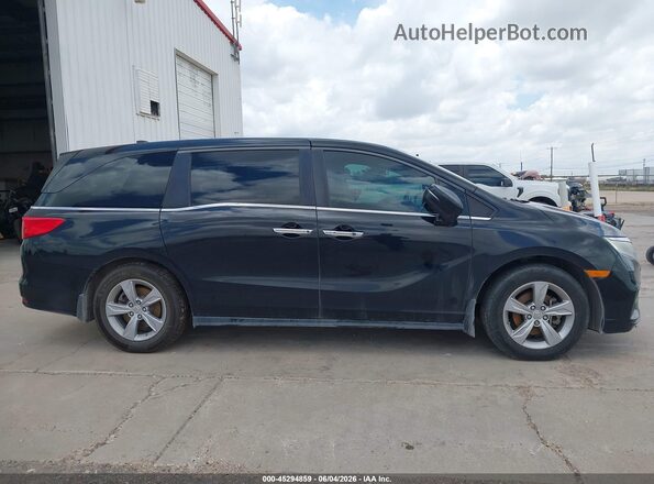 5FNRL6H56JB073815 2018 HONDA ODYSSEY Black Rear interior view