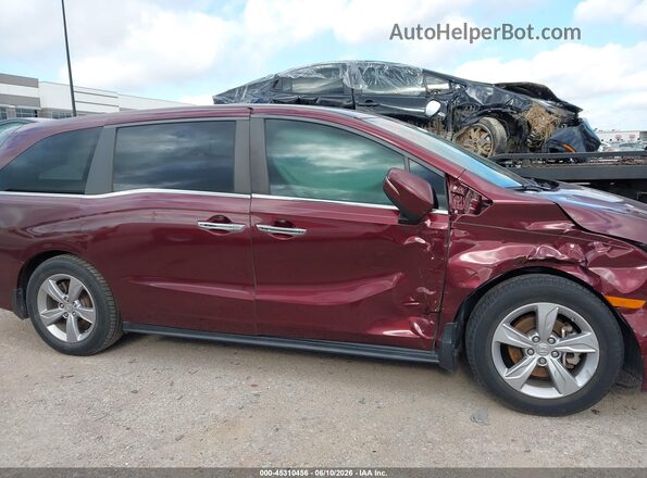 5FNRL6H57JB037406 2018 HONDA ODYSSEY Maroon Rear interior view