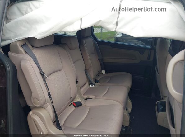 5FNRL6H57JB037406 2018 HONDA ODYSSEY Maroon Front interior view