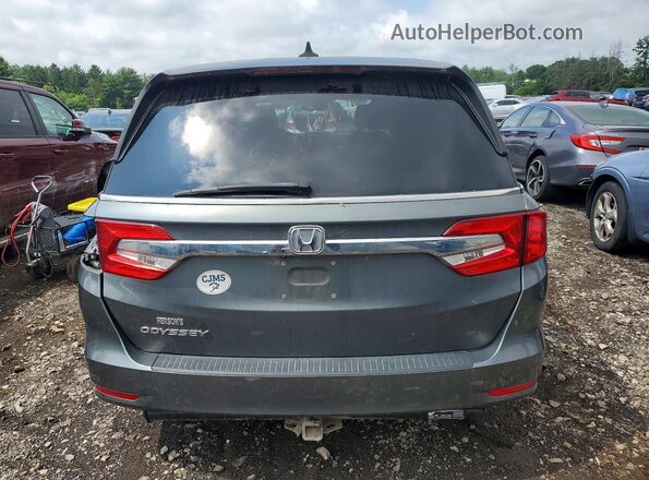 5FNRL6H71JB044384 2018 HONDA ODYSSEY Gray Rear view