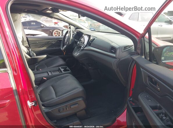 5FNRL6H72PB071487 2023 HONDA ODYSSEY Красный Вид салона спереди