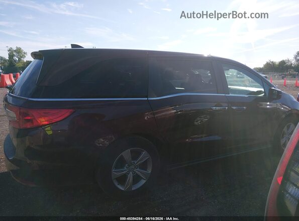 5FNRL6H78JB013701 2018 HONDA ODYSSEY Maroon Widok wnętrza z tyłu