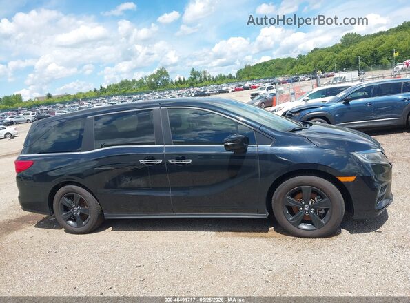 5FNRL6H79JB039451 2018 HONDA ODYSSEY Black Widok wnętrza z tyłu