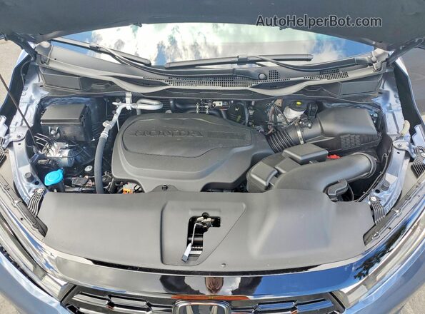 5FNRL6H81TB033817 2026 HONDA ODYSSEY Blue Widok wnętrza z tyłu