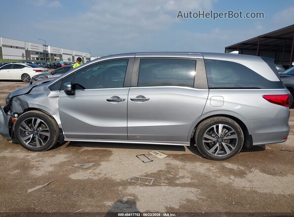 5FNRL6H82PB074575 2023 HONDA ODYSSEY Серебряный Вид задней части салона