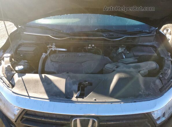 5FNRL6H83PB000016 2023 HONDA ODYSSEY Черный Вид задней части салона