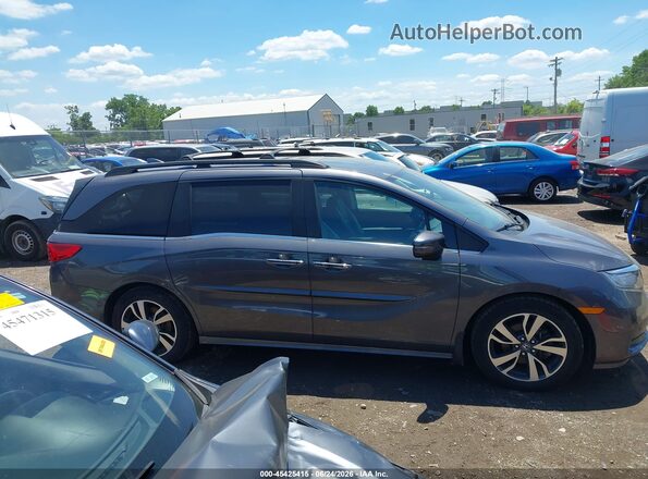 5FNRL6H87PB016770 2023 HONDA ODYSSEY Серый Вид задней части салона