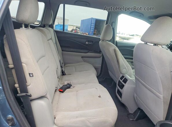 5FNYF5H18JB010029 2018 HONDA PILOT Blue Rear seats view