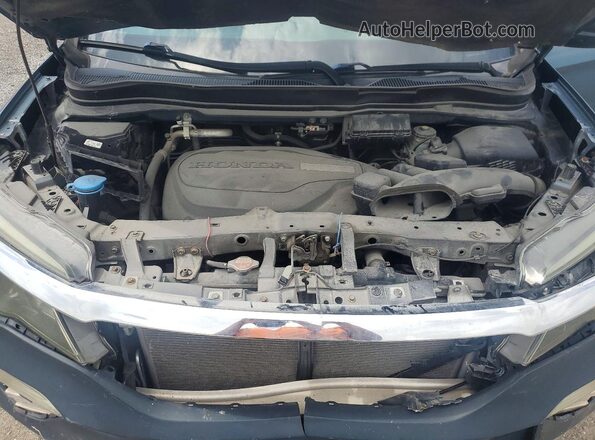 5FNYF5H18JB010029 2018 HONDA PILOT Blue Rear interior view