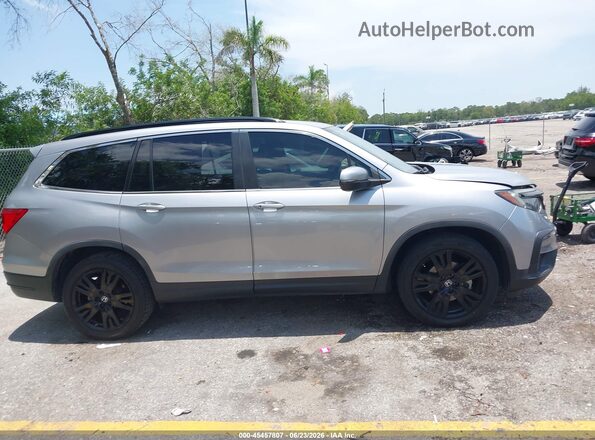 5FNYF5H25MB031336 2021 HONDA PILOT Silver Widok wnętrza z tyłu