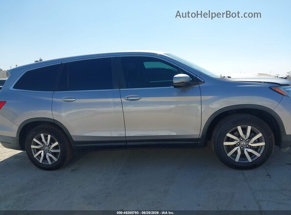 5FNYF5H31LB016954 2020 HONDA PILOT Серебряный Вид задней части салона