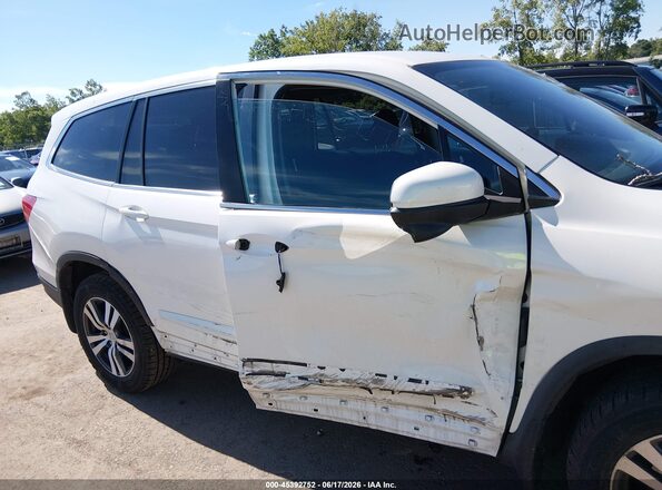 5FNYF5H35JB014282 2018 HONDA PILOT White Вид задньої частини салону