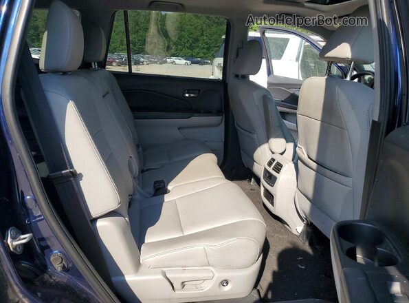 5FNYF5H56KB036553 2019 HONDA PILOT Blue Vista de los asientos traseros