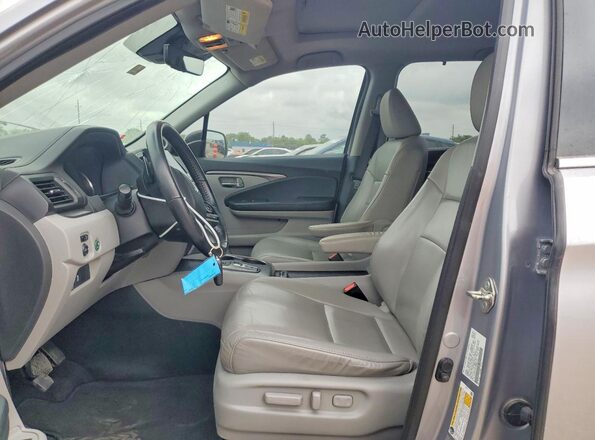 5FNYF5H57MB011227 2021 HONDA PILOT Silver Front interior view