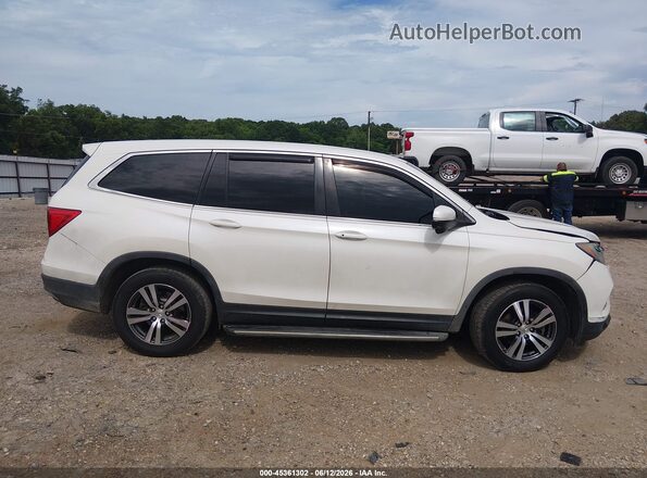 5FNYF5H59JB000290 2018 HONDA PILOT Белый Вид задней части салона