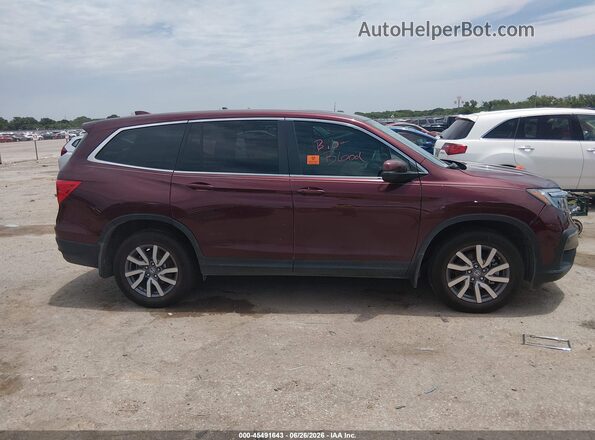 5FNYF5H5XKB017780 2019 HONDA PILOT Красный Вид задней части салона