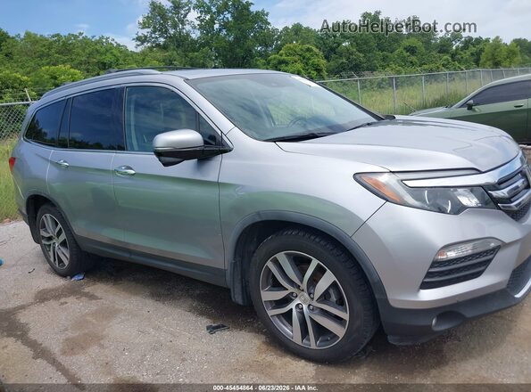 5FNYF5H92HB030356 2017 HONDA PILOT Silver Widok wnętrza z tyłu