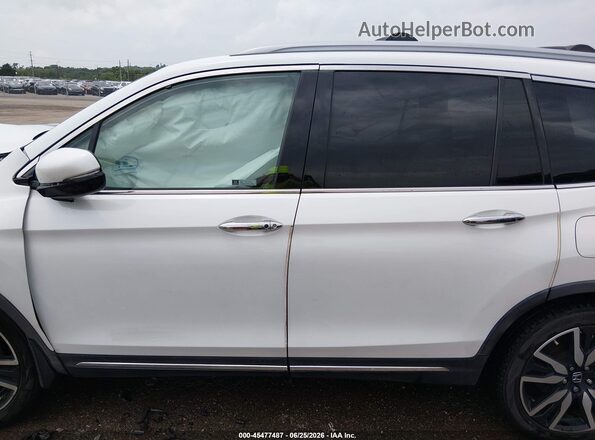 5FNYF5H97LB011990 2020 HONDA PILOT White Widok wnętrza z tyłu
