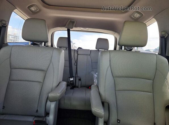 5FNYF6H02JB009553 2018 HONDA PILOT Silver Rear seats view