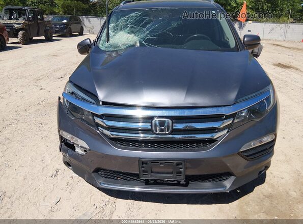 5FNYF6H09HB046366 2017 HONDA PILOT Серый Вид задней части салона
