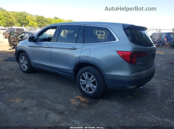 5FNYF6H19JB021515 2018 HONDA PILOT Light Blue Задня ліва чверть
