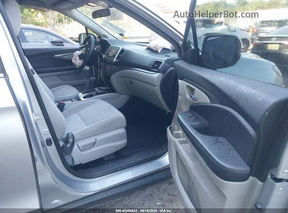 5FNYF6H19JB021515 2018 HONDA PILOT Light Blue Вид салону спереду