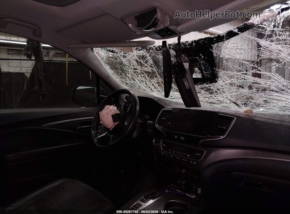 5FNYF6H23MB008871 2021 HONDA PILOT Black Front interior view