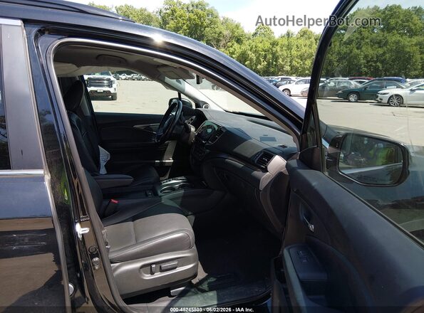 5FNYF6H26MB044442 2021 HONDA PILOT Черный Вид салона спереди