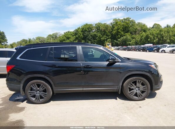 5FNYF6H26MB044442 2021 HONDA PILOT Черный Вид задней части салона