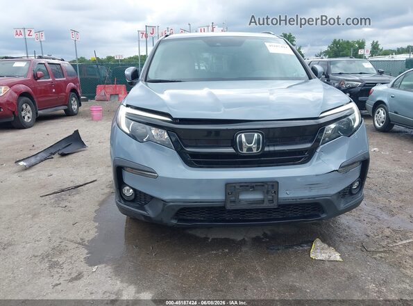 5FNYF6H28NB071935 2022 HONDA PILOT Light Blue Rear interior view