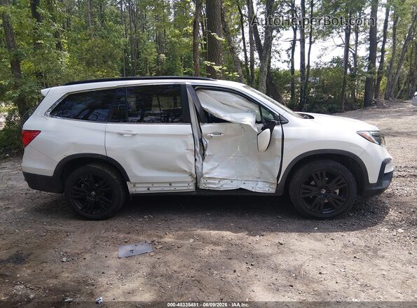 5FNYF6H29MB012925 2021 HONDA PILOT White Rear interior view